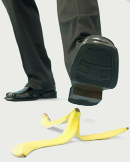 man stepping on banana peel